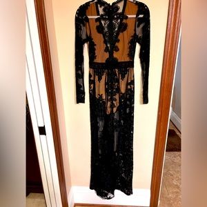 Show stopper! Love and Lemons brand but I bought it on Free People site. Small